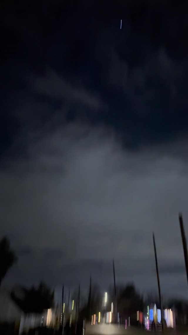 Orbs Passing In Background On Long Island